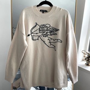 Motel brand cherub print oversized sweater